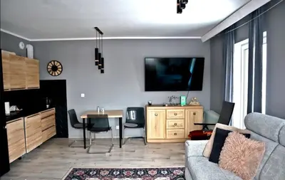 Telewizja i/lub zestaw kina domowego w obiekcie Apartament Słoneczna Polana