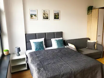 Łóżko lub łóżka w pokoju w obiekcie Apartimento Hydral Aria