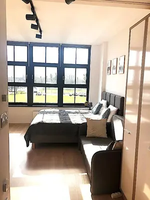 Łóżko lub łóżka w pokoju w obiekcie Apartimento Hydral Aria