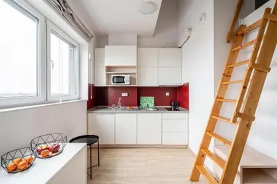 Kuchnia lub aneks kuchenny w obiekcie StarterApart Wrocław