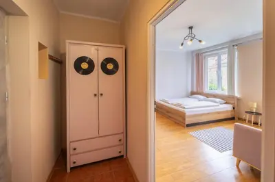 Łóżko lub łóżka w pokoju w obiekcie Magnolia Vision Apartment - Rynek