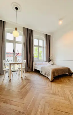 Łóżko lub łóżka w pokoju w obiekcie Apartamenty Lubin - Noclegi Lubin