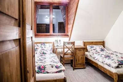 Łóżko lub łóżka w pokoju w obiekcie Dwa Dęby