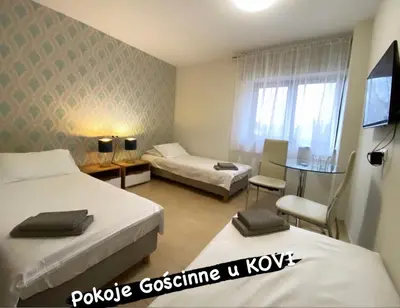 Łóżko lub łóżka w pokoju w obiekcie Pokoje Gościnne u Kovi