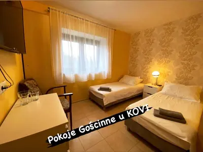 Łóżko lub łóżka w pokoju w obiekcie Pokoje Gościnne u Kovi
