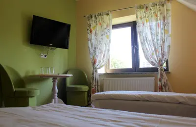 Telewizja i/lub zestaw kina domowego w obiekcie Pokoje Gościnne u Kovi