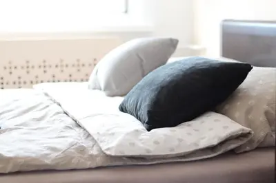 Łóżko lub łóżka w pokoju w obiekcie Apartament Dąbrowskiego - Gliwice