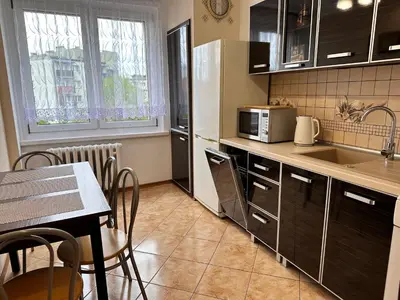 Kuchnia lub aneks kuchenny w obiekcie Apartament Dąbrowskiego - Gliwice