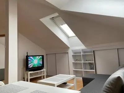 Telewizja i/lub zestaw kina domowego w obiekcie Apartament NOWY