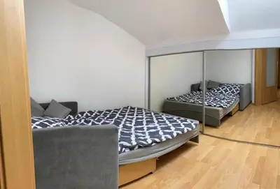 Łóżko lub łóżka w pokoju w obiekcie Apartament NOWY