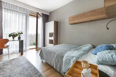 Łóżko lub łóżka w pokoju w obiekcie Luksusowy apartament z parkingiem w samym centrum Wrocławia