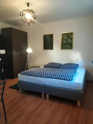 Łóżko lub łóżka w pokoju w obiekcie Good Morning Piaskowa Góra