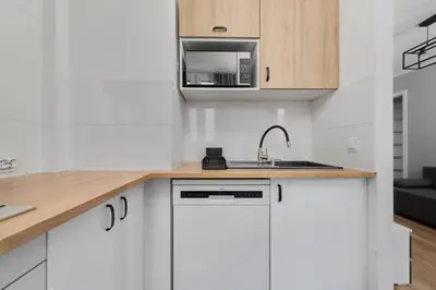 Kuchnia lub aneks kuchenny w obiekcie Apartament Studzienna Wrocław by Noclegi Renters