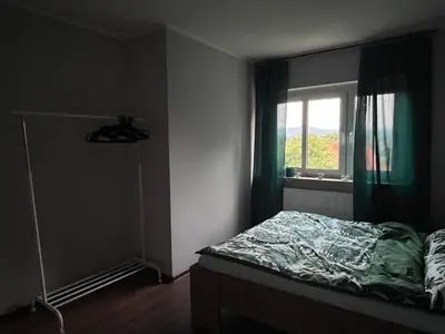 Łóżko lub łóżka w pokoju w obiekcie Apartament Wzgórze Gedymina