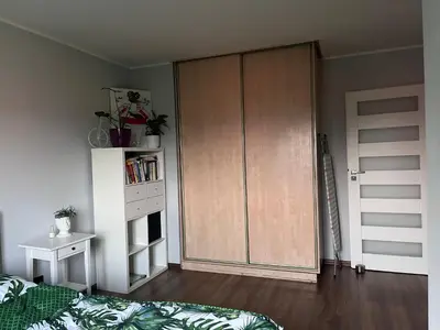 Łóżko lub łóżka w pokoju w obiekcie Apartament Wzgórze Gedymina