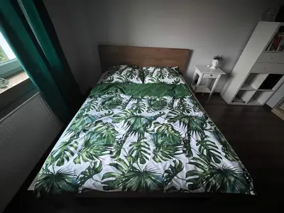 Łóżko lub łóżka w pokoju w obiekcie Apartament Wzgórze Gedymina