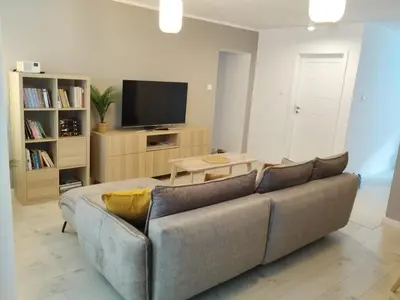 Telewizja i/lub zestaw kina domowego w obiekcie Moon Apartment