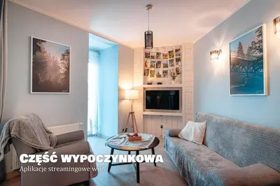 Telewizja i/lub zestaw kina domowego w obiekcie Apartament Fotografa