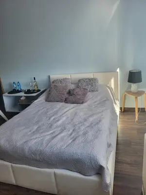 Łóżko lub łóżka w pokoju w obiekcie Apartament Ares