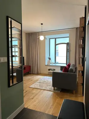 Część wypoczynkowa w obiekcie Cozy Apartment - Staromłyńska II Młyn Maria