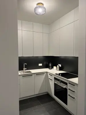 Kuchnia lub aneks kuchenny w obiekcie Cozy Apartment - Staromłyńska II Młyn Maria
