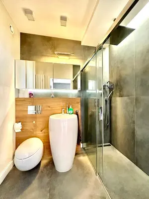 Łazienka w obiekcie PODWALE 2 Apt 54 - Self Check-In 20h - Parking & Lift