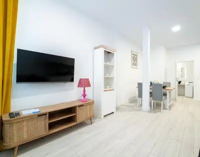 Telewizja i/lub zestaw kina domowego w obiekcie Reymonta 22 Apartamenty