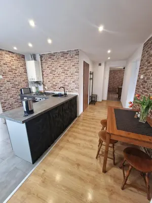Kuchnia lub aneks kuchenny w obiekcie Przestronny apartament +siłownia
