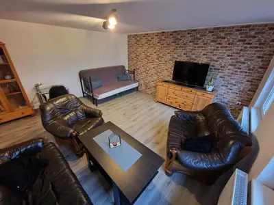 Telewizja i/lub zestaw kina domowego w obiekcie Przestronny apartament +siłownia