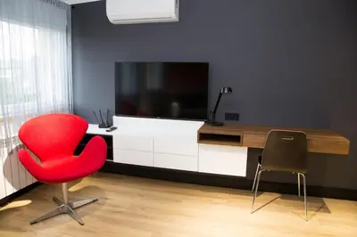 Telewizja i/lub zestaw kina domowego w obiekcie Apartament NEPTUN Centrum