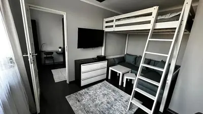 Telewizja i/lub zestaw kina domowego w obiekcie Apartament Festiwalowy