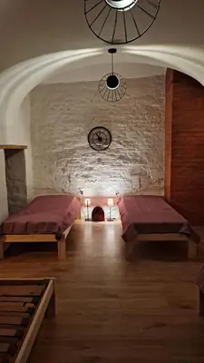Łóżko lub łóżka w pokoju w obiekcie Noclegi Czentorycki 2
