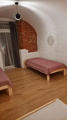 Łóżko lub łóżka w pokoju w obiekcie Noclegi Czentorycki 2