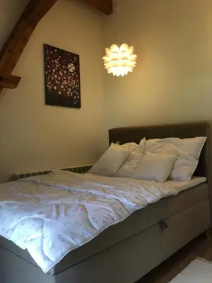Łóżko lub łóżka w pokoju w obiekcie Apartament Ostoja