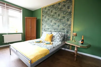 Łóżko lub łóżka w pokoju w obiekcie Apartament Stary Zdrój