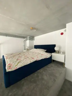 Łóżko lub łóżka w pokoju w obiekcie Apartament Wrocław-Lotnisko