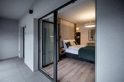 Łóżko lub łóżka w pokoju w obiekcie RentPlanet - Atal City Square