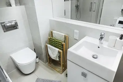 Łazienka w obiekcie Komfort z balkonem w centrum