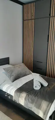 Łóżko lub łóżka w pokoju w obiekcie Belweder LOFT