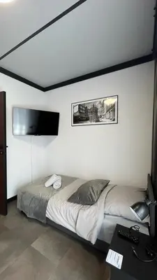 Łóżko lub łóżka w pokoju w obiekcie Belweder LOFT