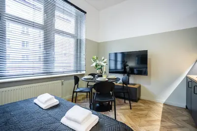 Telewizja i/lub zestaw kina domowego w obiekcie Studio Loft Old Town by #Hoomvi