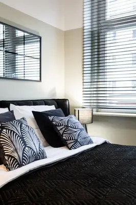 Łóżko lub łóżka w pokoju w obiekcie Studio Loft Old Town by #Hoomvi