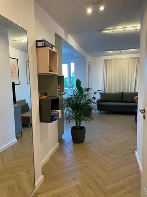 Część wypoczynkowa w obiekcie Apartament na Letniej z dużym tarasem z widokiem na góry