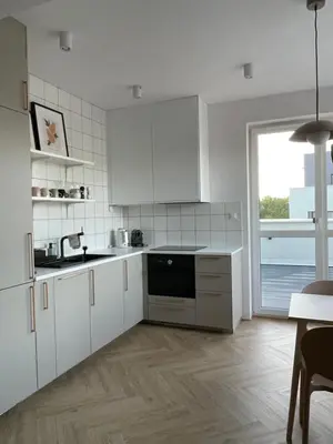 Kuchnia lub aneks kuchenny w obiekcie Apartament na Letniej z dużym tarasem z widokiem na góry