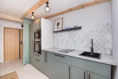 Kuchnia lub aneks kuchenny w obiekcie Apartament Nowy Świat 1
