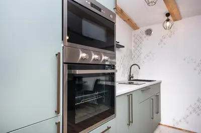 Kuchnia lub aneks kuchenny w obiekcie Apartament Nowy Świat 1