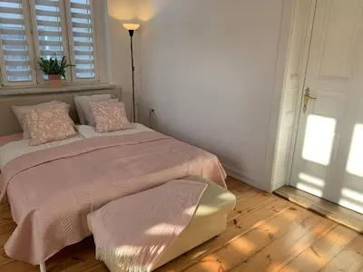 Łóżko lub łóżka w pokoju w obiekcie Na skraju Rynku 110 m2