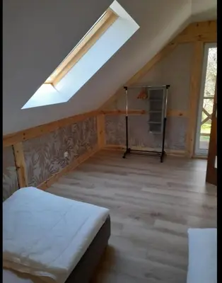 Łóżko lub łóżka w pokoju w obiekcie Noclegi w Kudowie