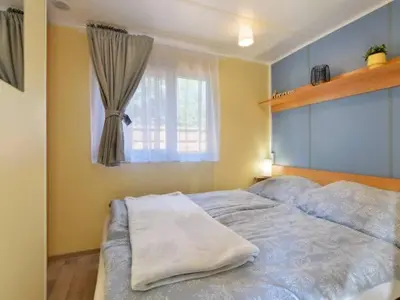 Łóżko lub łóżka w pokoju w obiekcie Zielony Domek Słoszów 3