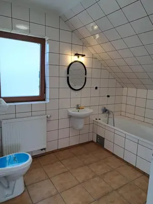 Łazienka w obiekcie Ogrodowe Noclegi